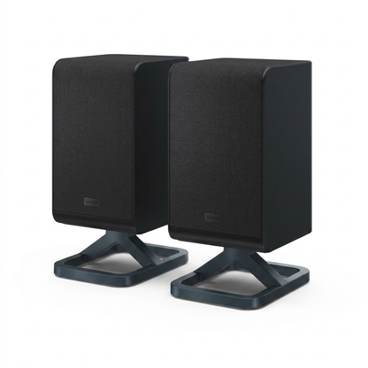 A photorealistic studio product photograph of the pair of SHARP HTC-SPR52021-BK wireless rear surround speakers, angled to show the front and right side. They are centered on a pure white background with a soft natural shadow.