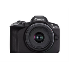 Front view of a black Canon EOS R50 mirrorless camera with an RF-S 18-45mm lens kit.