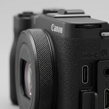 Macro close-up of Canon PowerShot V10 textured grip, multiway-control buttons, USB-C and HDMI ports.