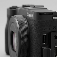 Macro close-up of Canon PowerShot V1 textured grip, multiway-control buttons, USB-C and HDMI ports.