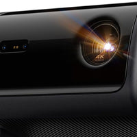 Close-up of the Dangbei MP1 Max lens with 4K Ultra HD badge and ToF autofocus sensor