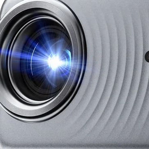 Close-up of the Dangbei N3 Max projector lens and textured grey front panel