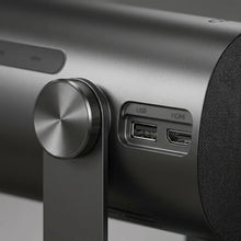Extreme macro view captures the Dangbei Freedo projector's metal body texture, precision dial, and connection ports.