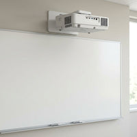 Epson BrightLink 770Fi projector and pens in a classroom.