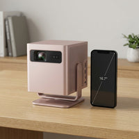 Epson EpiqVision Mini EF-22R projector beside a smartphone on a desk.