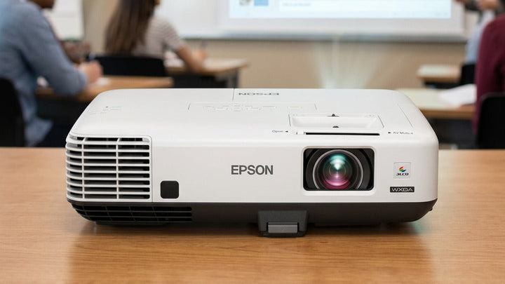 Epson PowerLite 535W Short Throw Projector in use on a classroom desk.