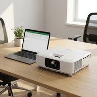 Epson PowerLite L210SW projector next to a 13-inch laptop on an office desk.