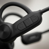 Macro close-up of the waterproof controls and textured surface on the SHARP HP-BC55.