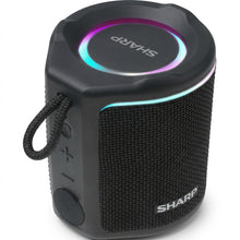 Black Sharp GX-BT190-BK portable Bluetooth speaker on a white background, shown at an angle with its glowing pink-and-teal LED ring lit, fabric grille, rubber carry loop, and side control buttons.