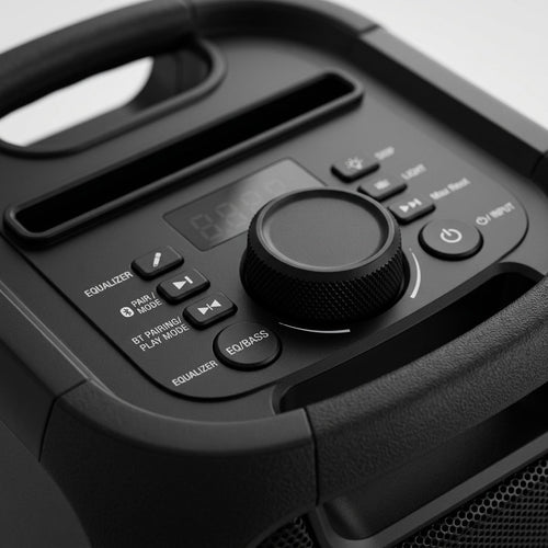 Extreme macro view of the Sharp PS-914 speaker top controls, showing knobs, buttons, and material textures.