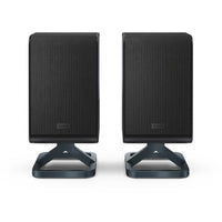 Sharp HT-SPR52021-BK 2.0.2 channel wireless rear surround speakers in black, front view on integrated stands.
